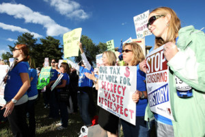 GOLDEN, CO - OCTOBER 02:  Community members participate in a protest at JEFFCO Public Schools on October 2, 2014 in Golden, Colorado.  (Photo by Jason Bahr/Getty Images for MoveOn.org Civic Action)