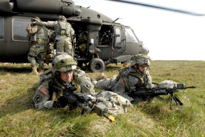 U.S. Army Soldiers from 173rd Airborne Brigade Combat Team provide security after dismounting an UH-60 Black Hawk helicopter during training at the Joint Multi-National Training Center in Hohenfels, Germany, March 31, 2007, for their upcoming deployment to Afghanistan. The Soldiers refined their skills in mounted and dismounted patrols, small unit tactics, military operations in urban terrain, counter-improved explosive devices and long range marksmanship. (U.S. Army photo by Gary L. Kieffer) (Released)
