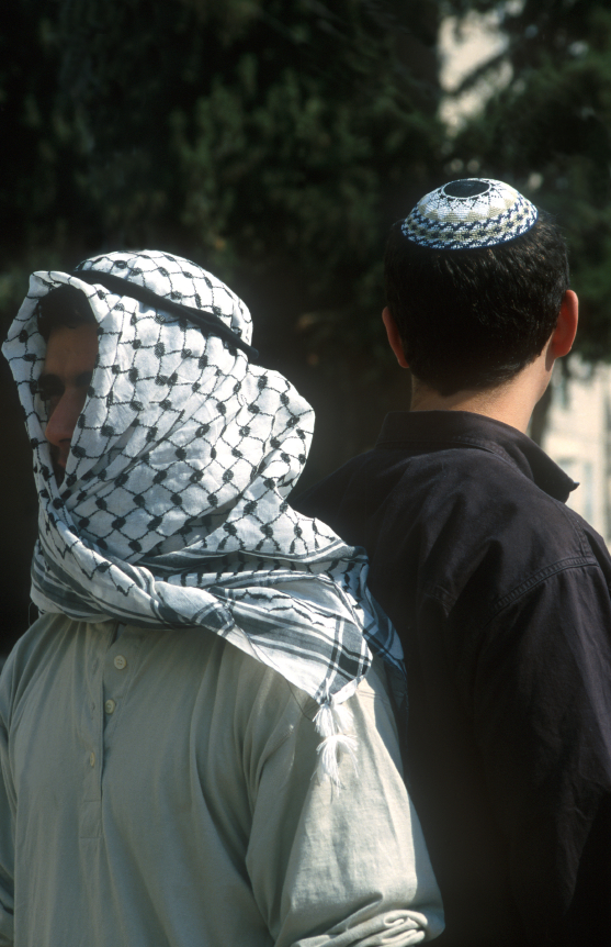 Jew and Arab looking away from each other.